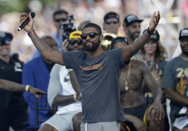 Crowd swarms Cleveland for Cavs title parade, rally