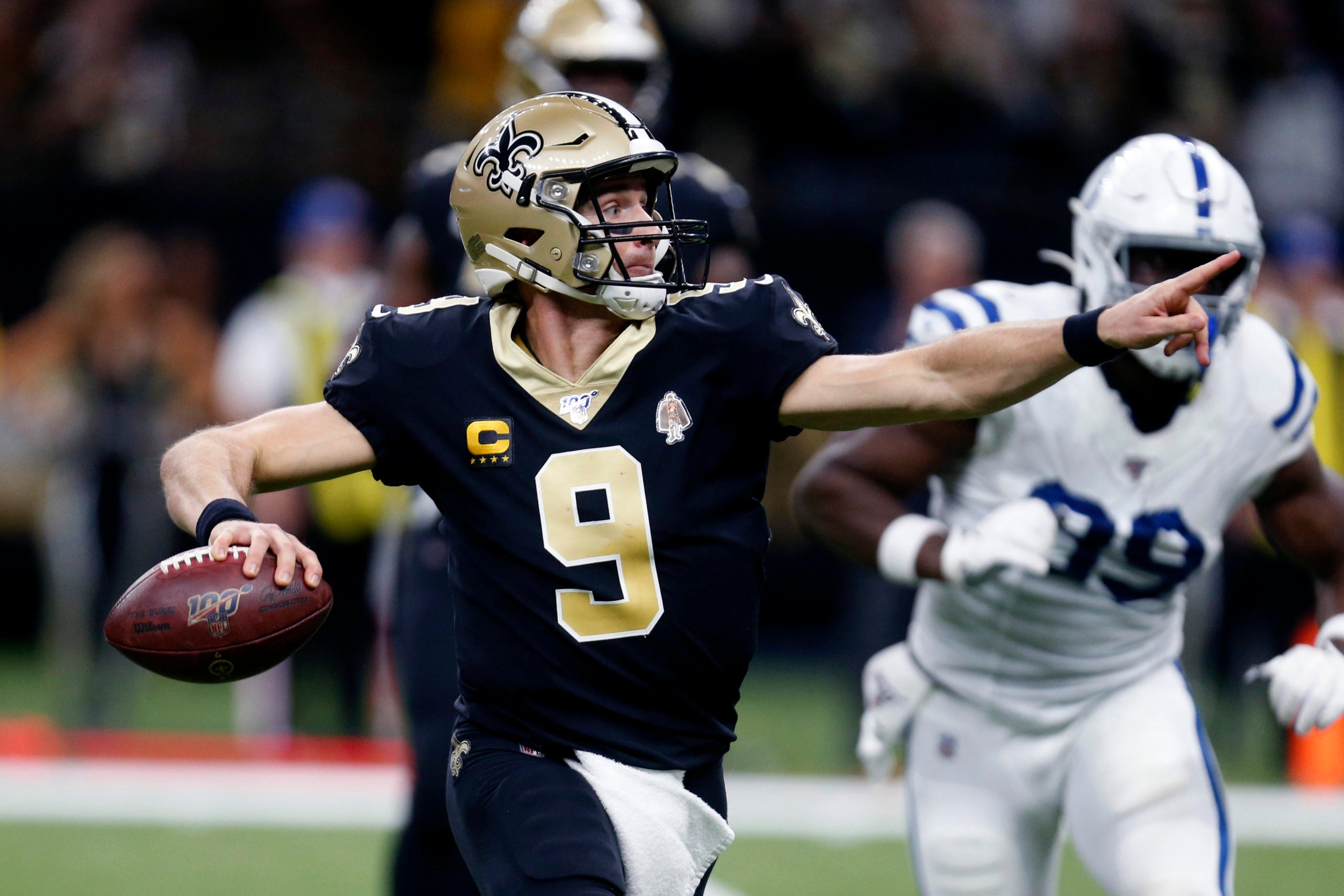 Brees sets NFL all-time TD mark as Saints crush Colts 34-7.