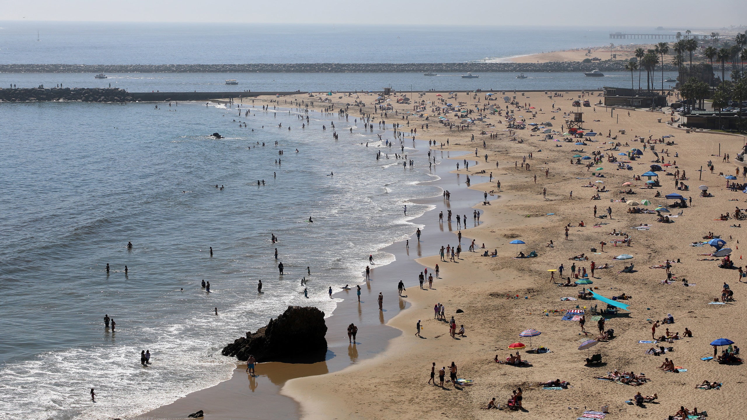 People crowd Southern California beaches despite coronavirus ...