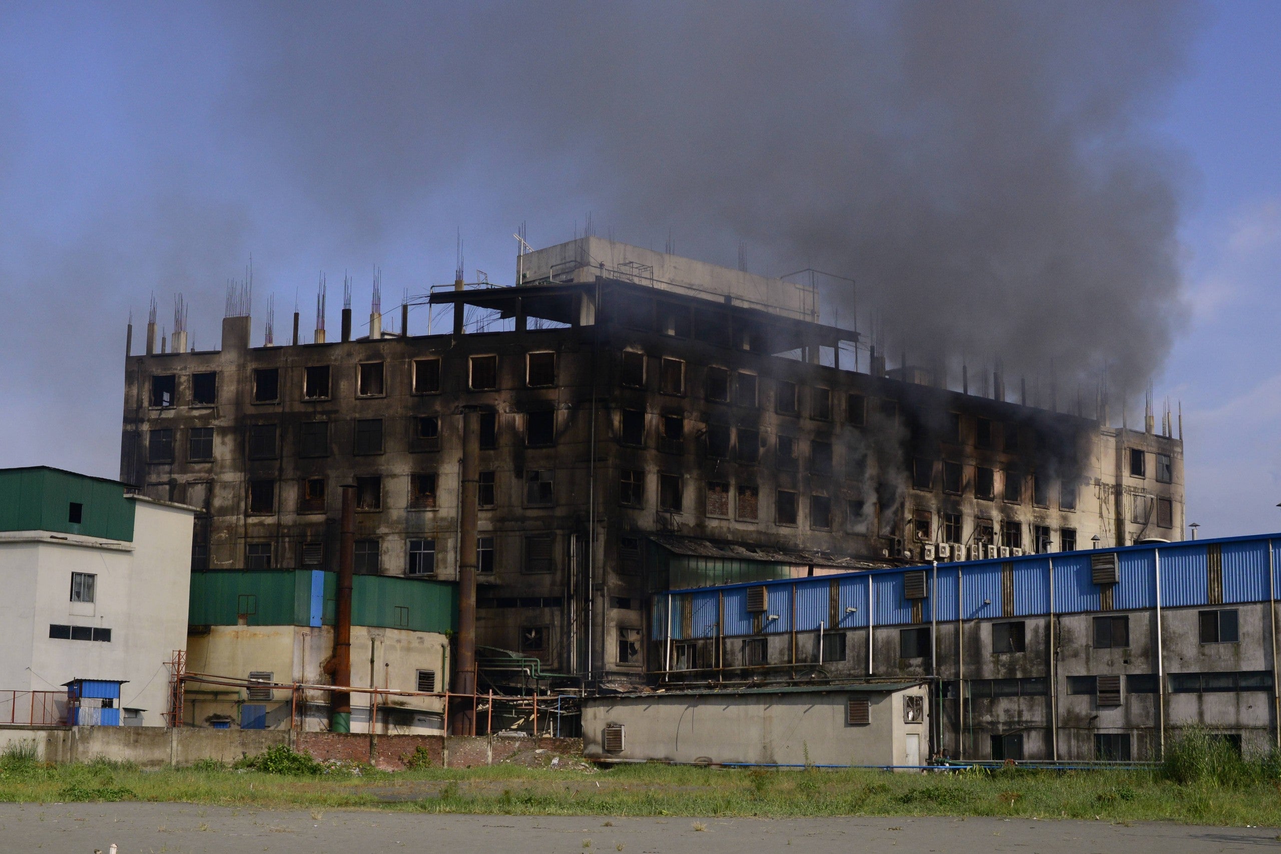 52 dead in Bangladesh factory fire as workers locked inside - WISH-TV ...