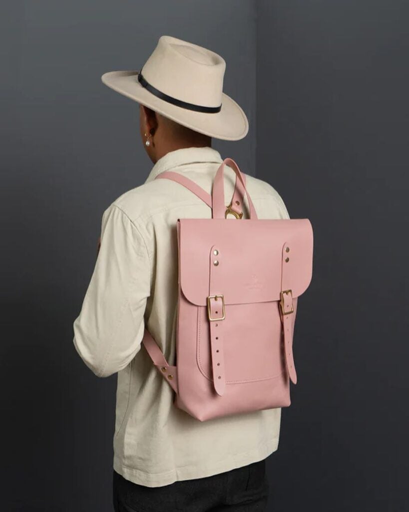 Howl + Hide Blush collection man with backpack on