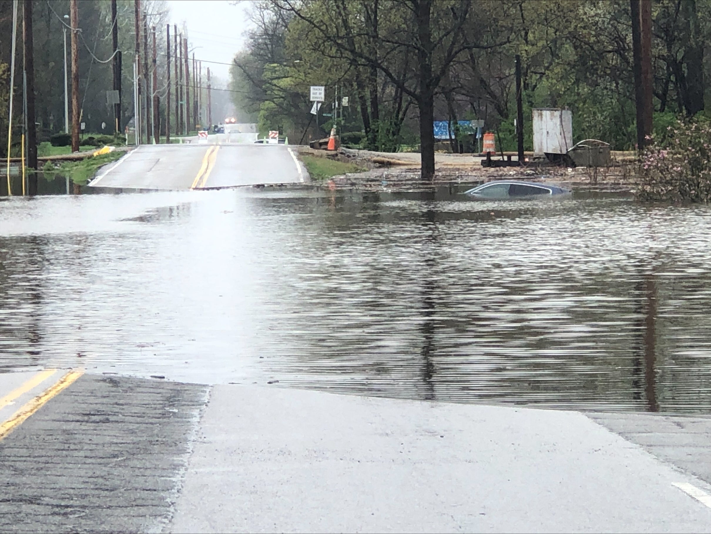 A submerged vehicle in high water near 75th Street and Binfod Boulevard in Indianapolis (WISH Photo/Kyle Fisher)