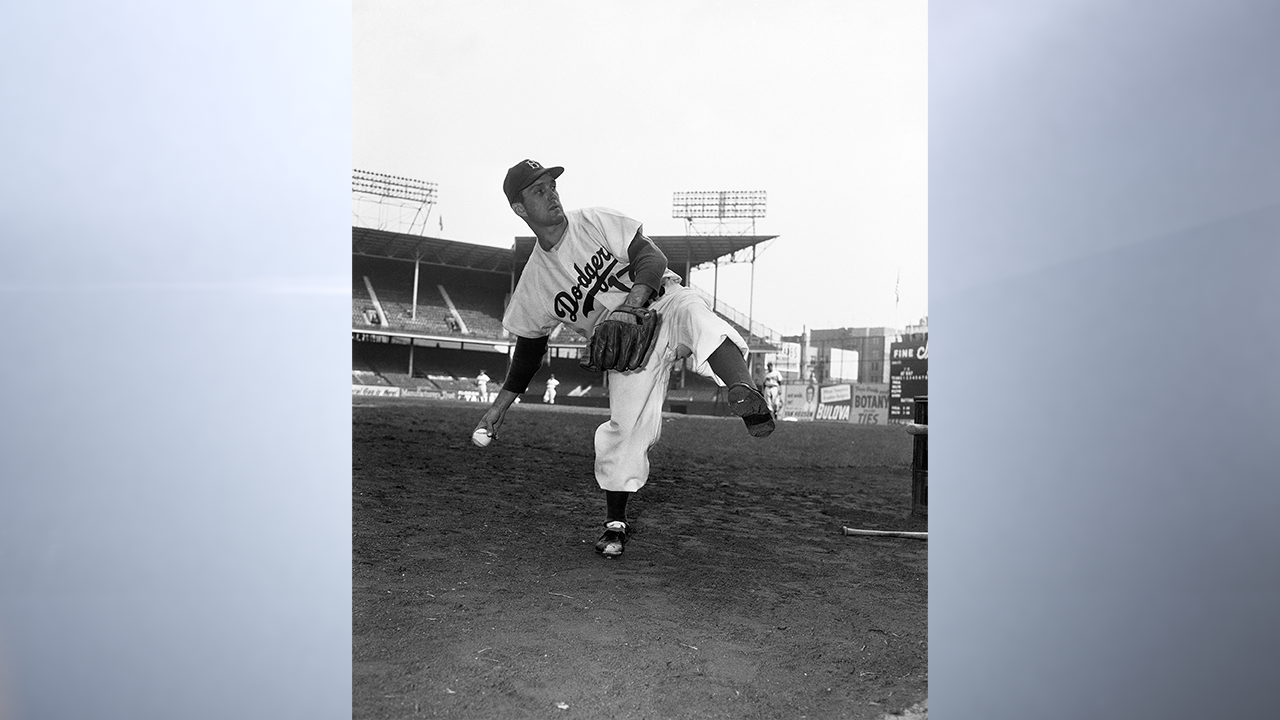 Carl Erskine of the Dodgers and Vic Raschi of the New York Yankees, a pair of righthanders, will be the opposing moundsmen in the second game of the 1952 World Series to be played at Ebbets Field in Brooklyn, N.Y., October 1, 1953. Erskine practices October 1, 1953 in this photo. (AP Photo)