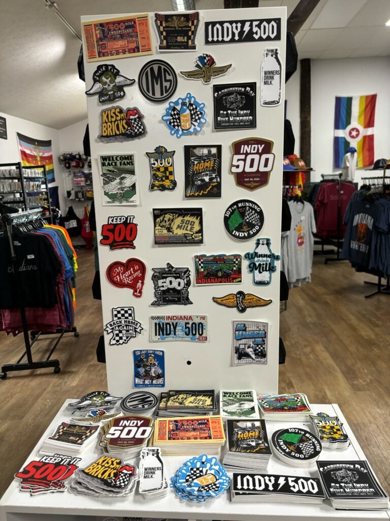 Indy 500 merch and gear, a wall of stickers